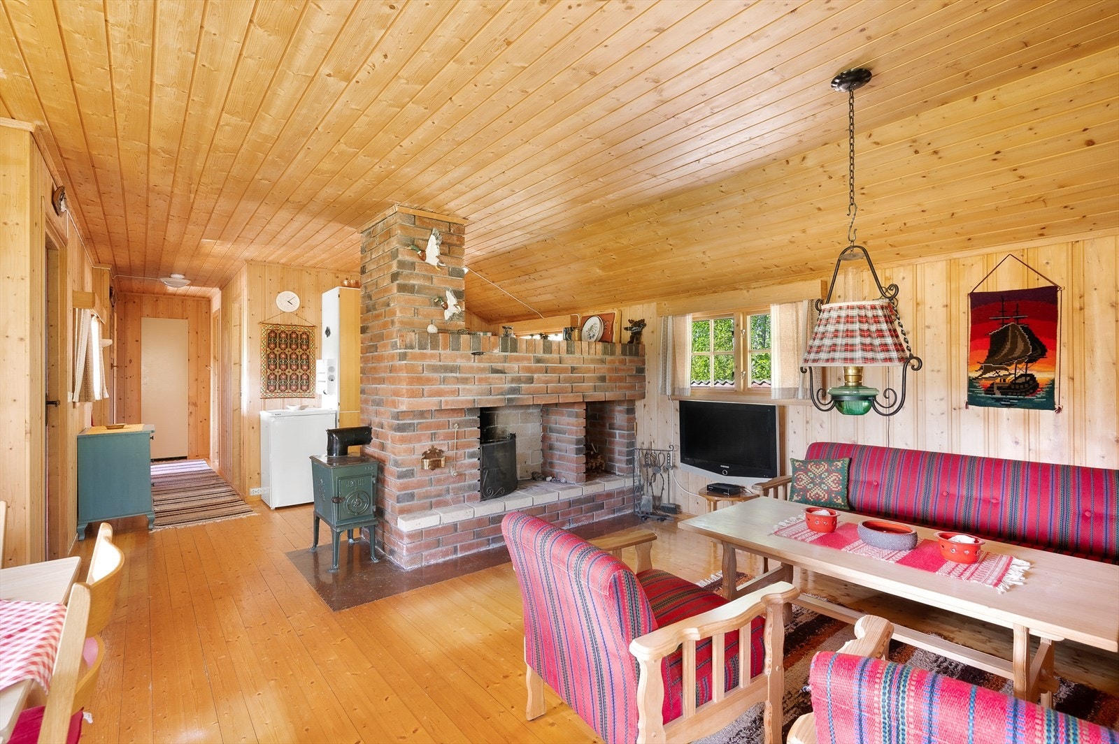 Stue med tilhørende innbo/løsøre. Åpen peis Galleribilde