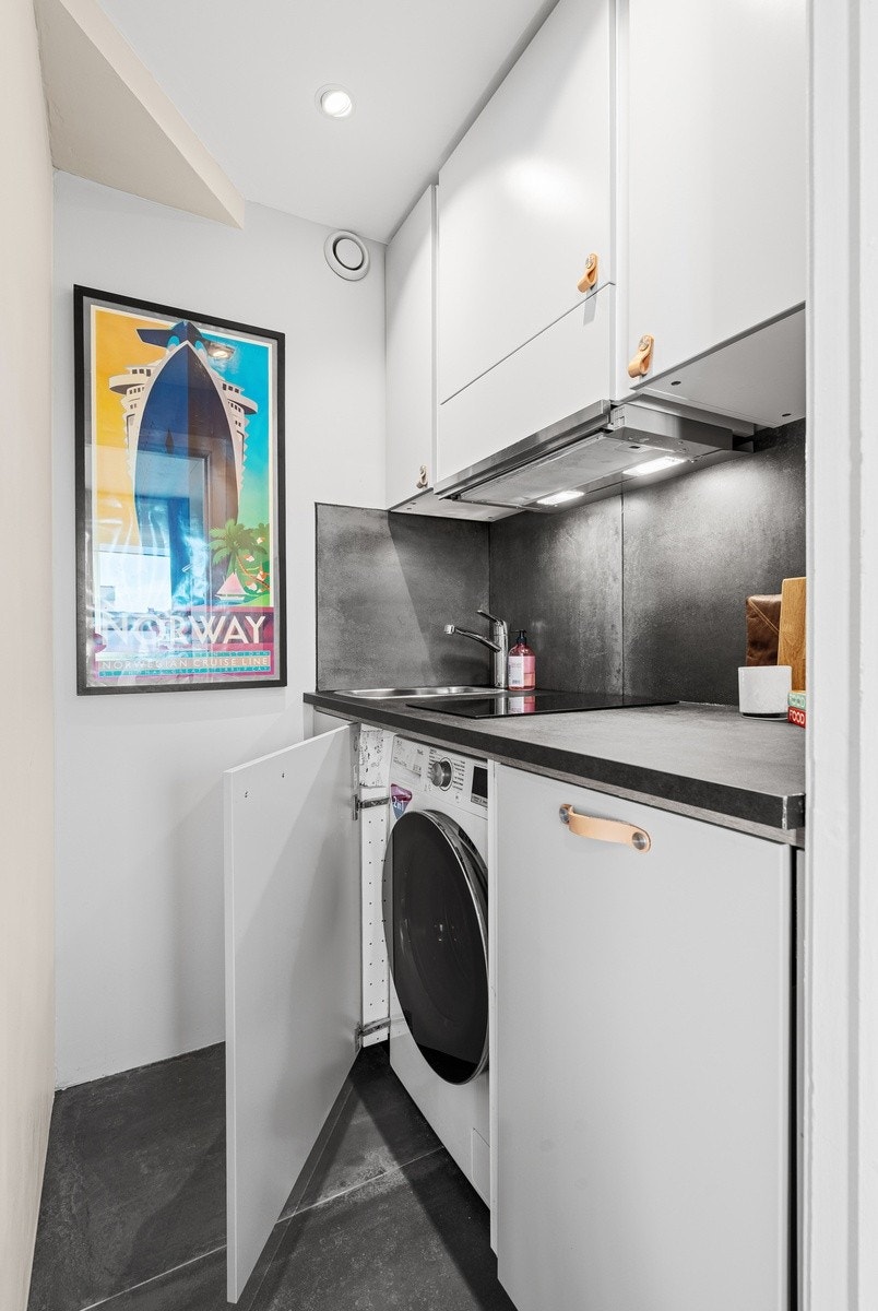 Vaskemaskin og tørketrommel i ett Galleribilde