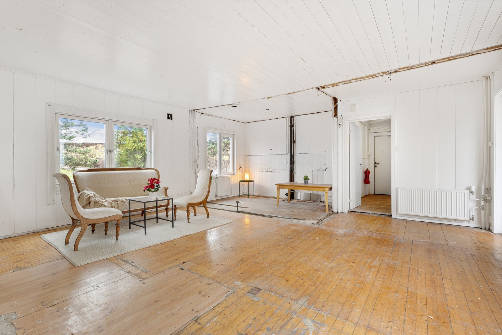 Boligen har en romslig stue i første etasje. Galleribilde