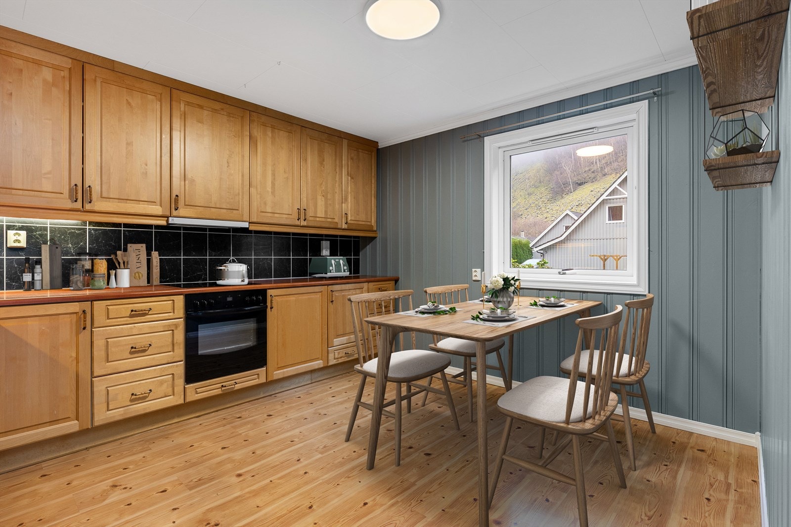 Kjøkkenet har profilerte frontar og laminat benkeplate. Galleribilde