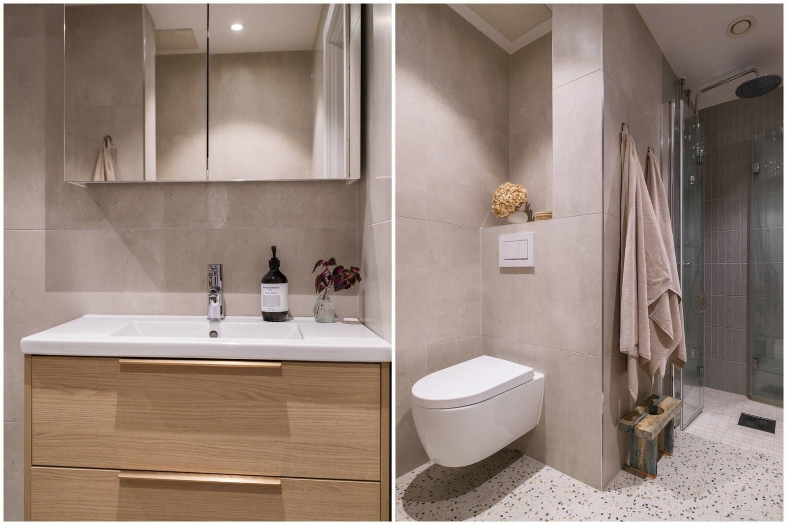 Flislagt gulv med varmekabler, flislagte vegger og malt himling med downlights. Galleribilde