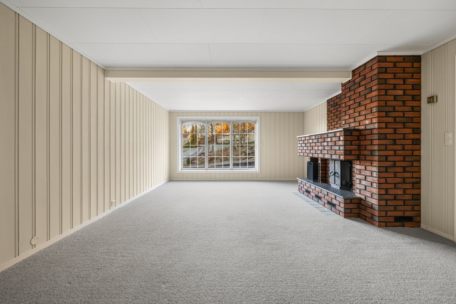 Koselig peisstue med rom for ro og avslapning Galleribilde