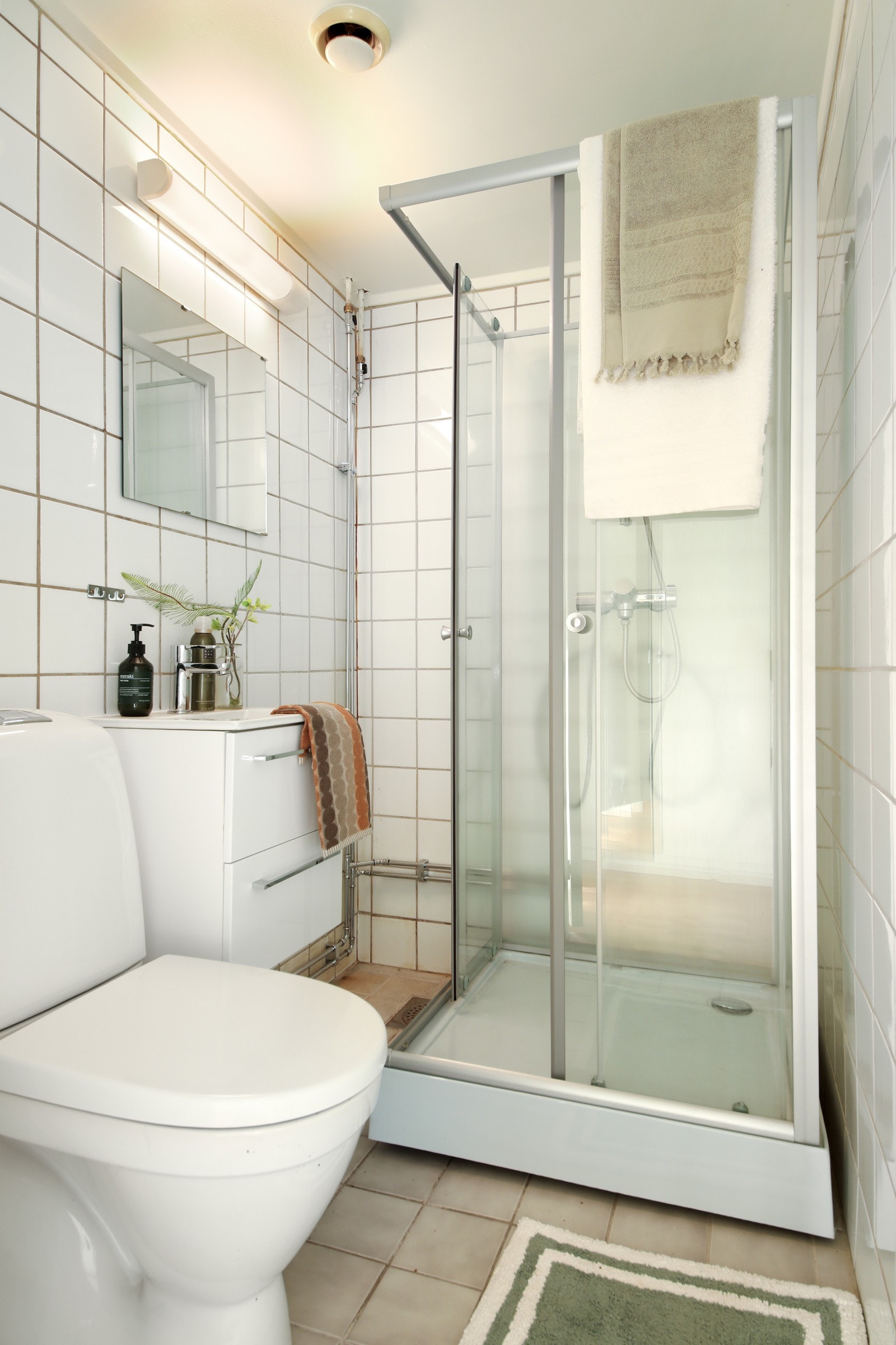 Flislagt bad med gulvvarme Galleribilde