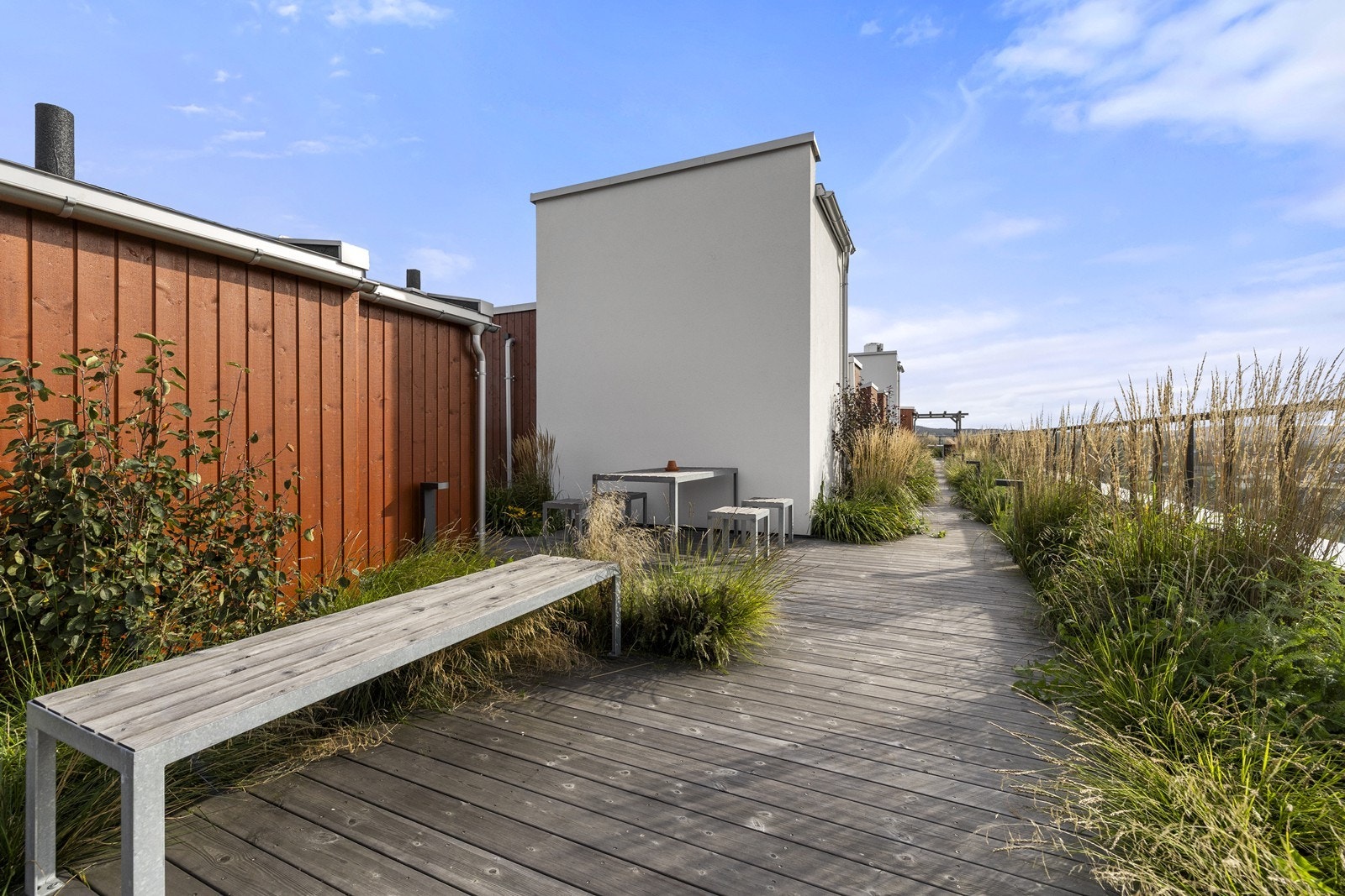 Beboerne har tilgang til en felles takterrasse med gode solforhold. Galleribilde