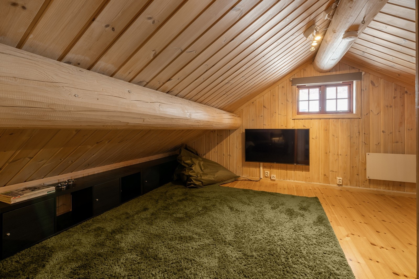 Loftstuen er perfekt for den yngre garde, med lek, moro, spill og TV-titting. Galleribilde