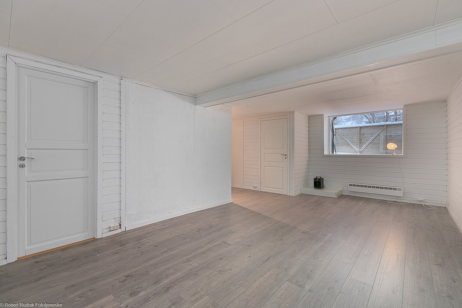 Leiligheten har lys og romslig stue. Galleribilde