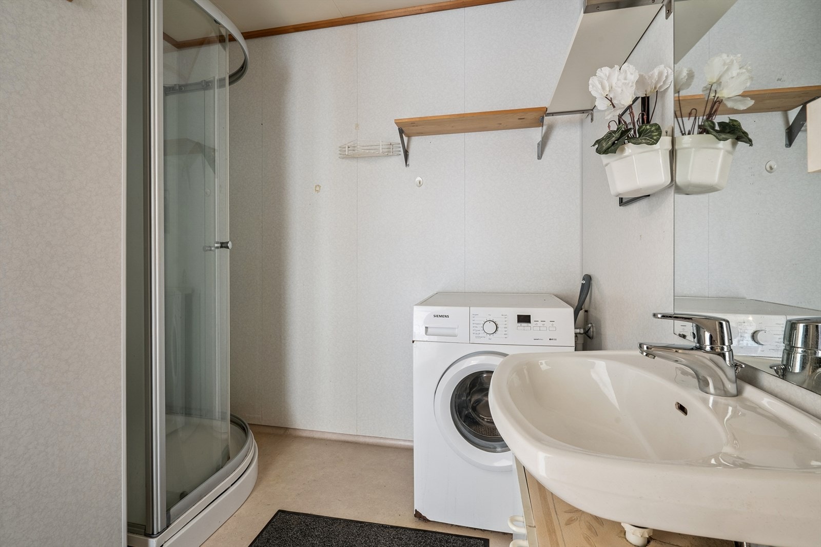 Det er opplegg for vaskemaskin. Galleribilde