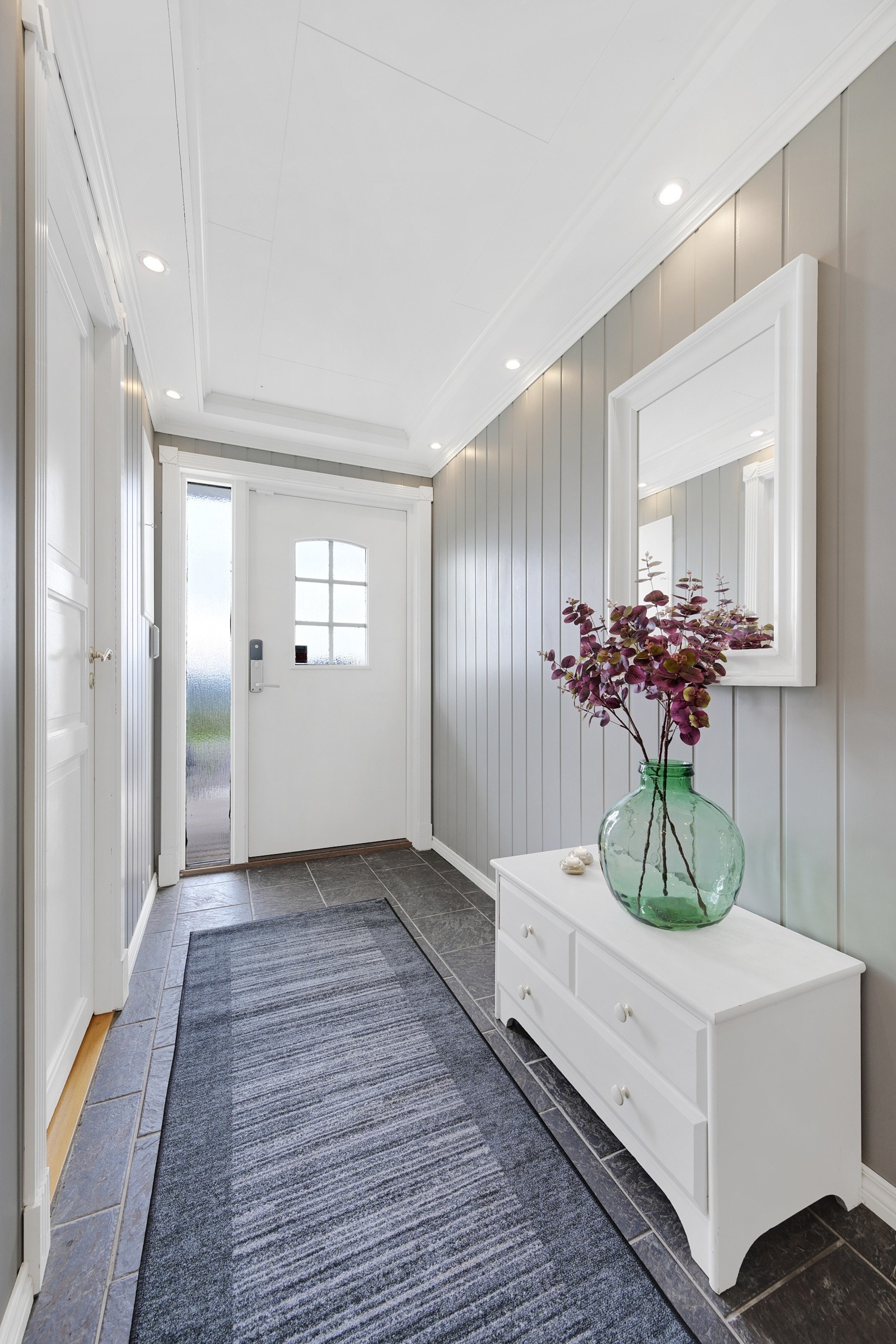 En varm og innbydende entrè ønsker deg velkommen inn Galleribilde