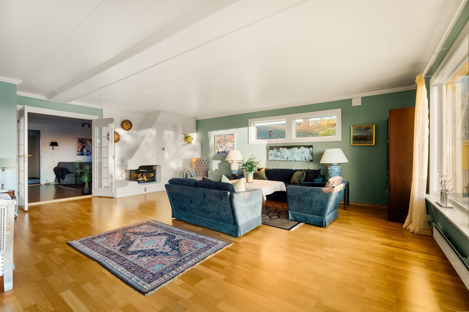 Hyggelig peis i begge stuer Galleribilde