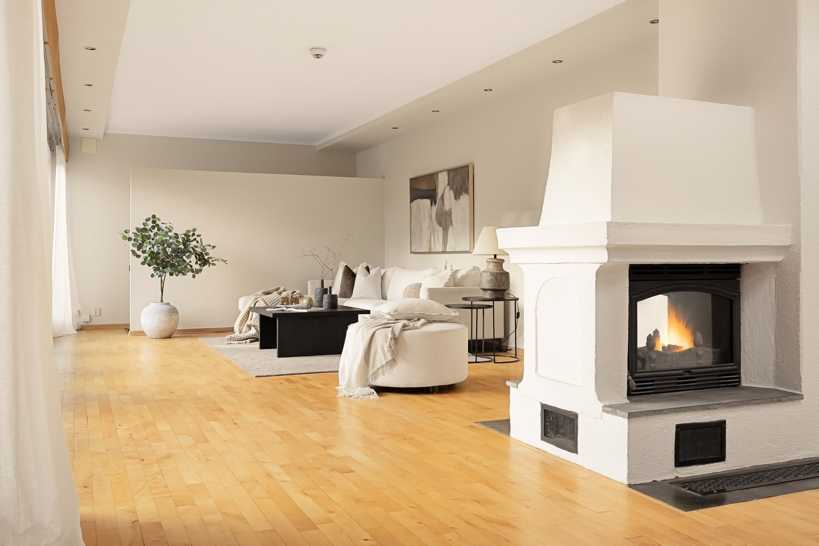 Vedovn i stue gir en lun og hyggelig atmosfære Galleribilde