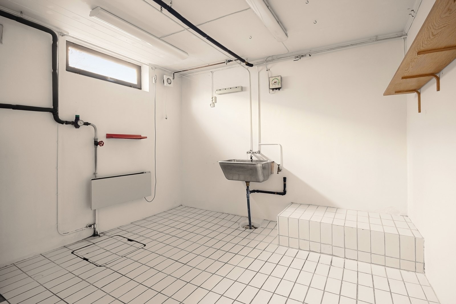 Praktisk rom med utslagsvask Galleribilde