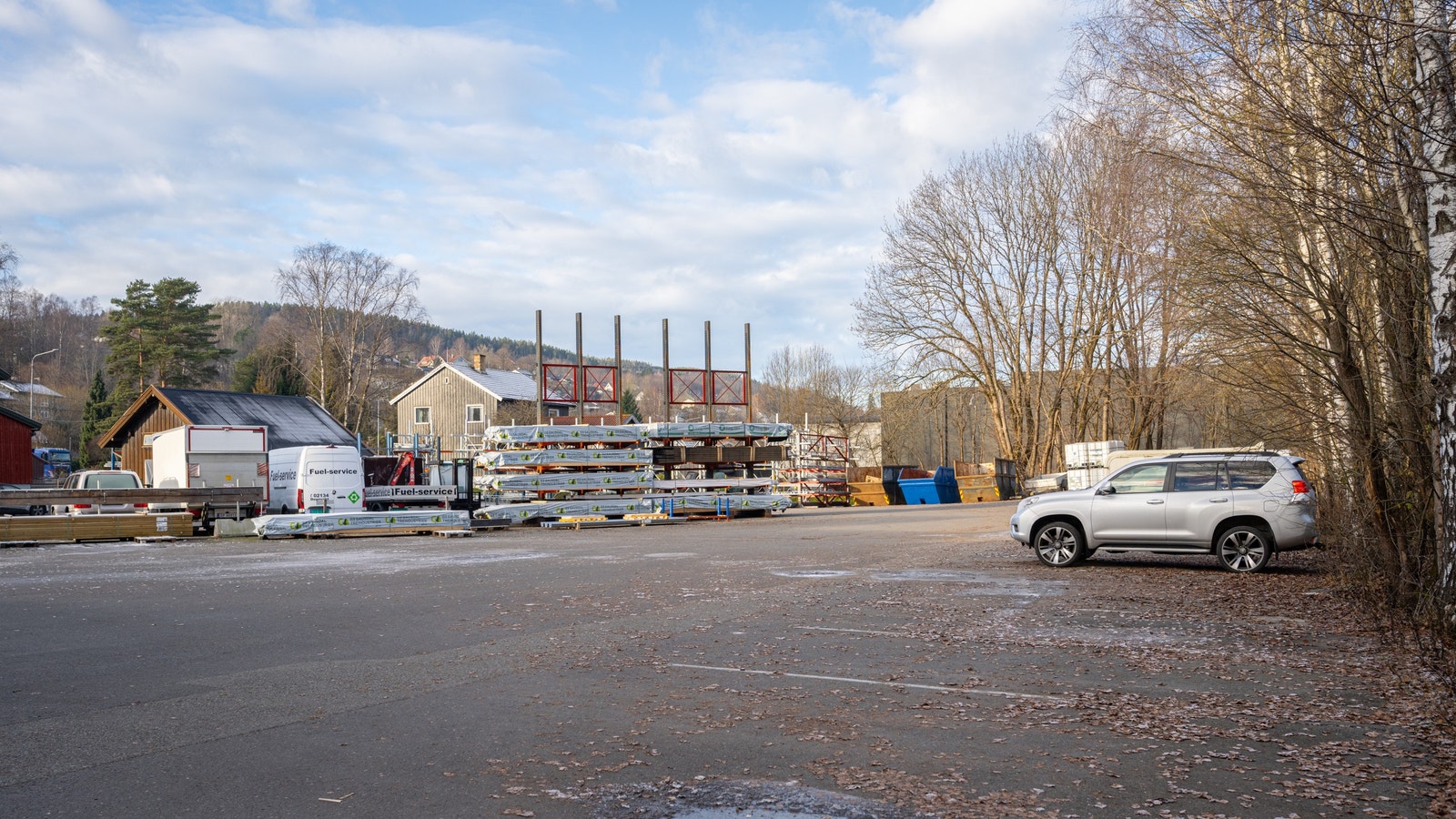 Asfaltert og flat tomt. Galleribilde