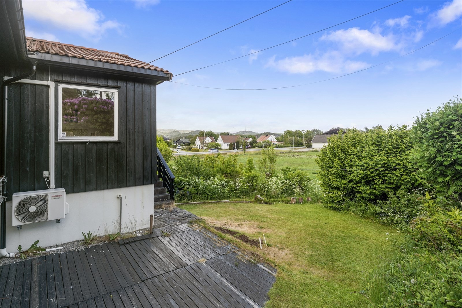 Fra boligen er det fin utsikt mot kulturlandskapet i området Galleribilde