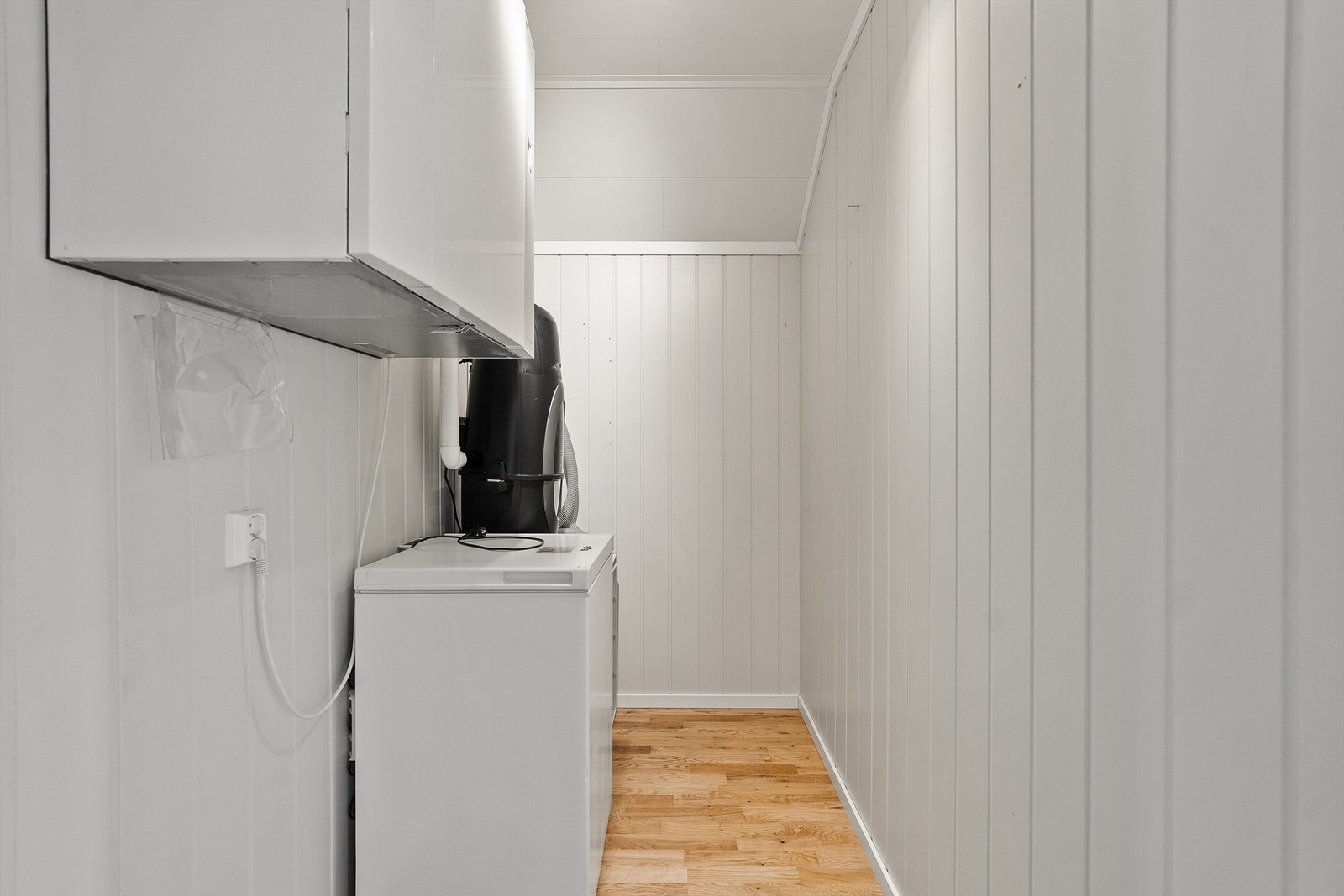 Bod i andre etasje med enhet til sentralstøvsuger. Galleribilde