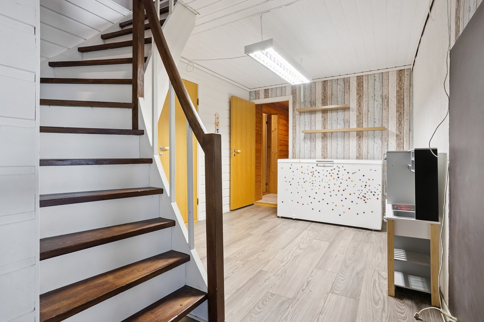 Romslig trappegang med plass til møblering og oppbevaring Galleribilde
