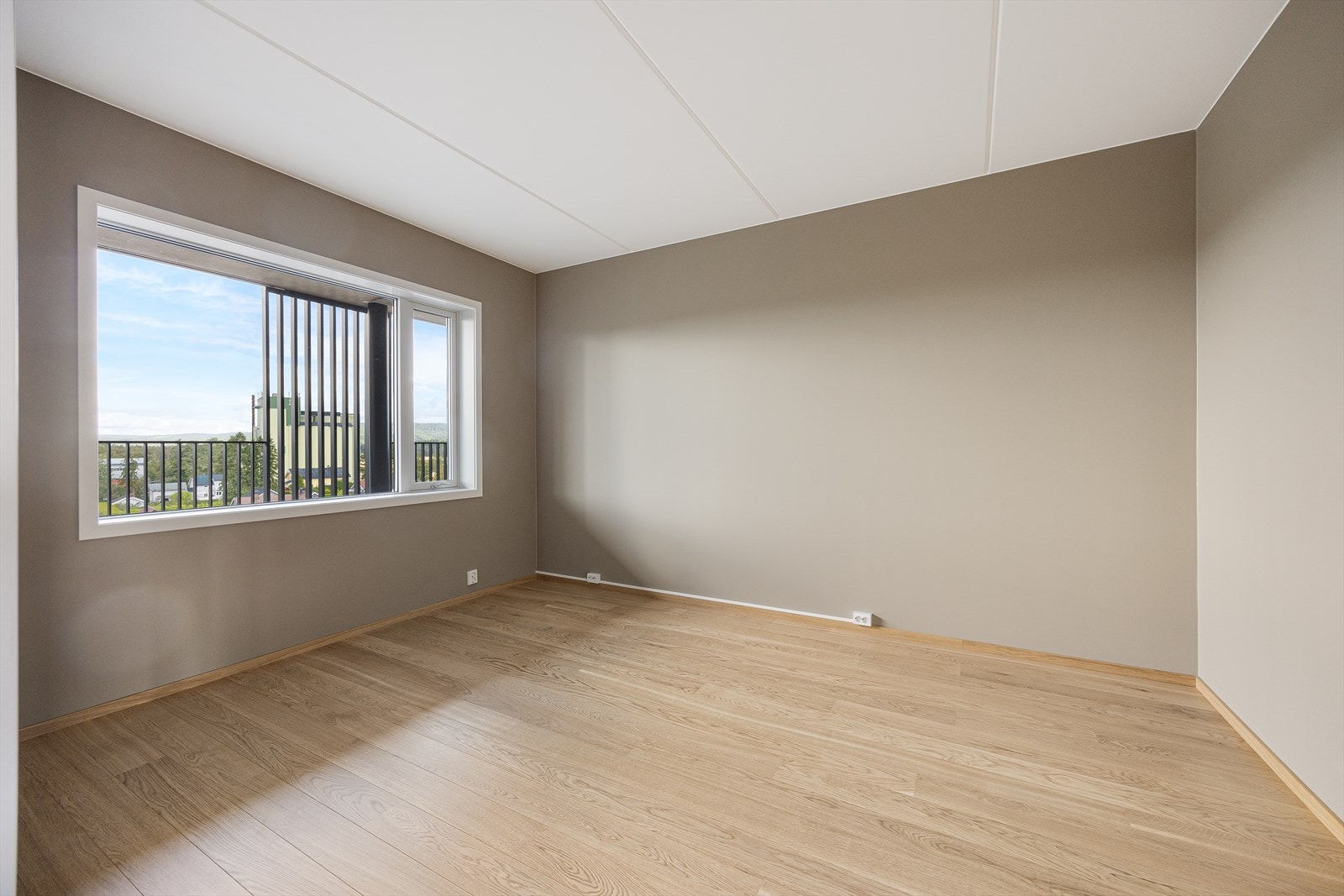 Rommene er malt i den samme gråfargen som de øvrige oppholdsrommene Galleribilde