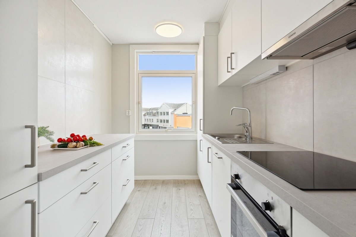 Leilighetens kjøkken - med et moderne uttrykk Galleribilde