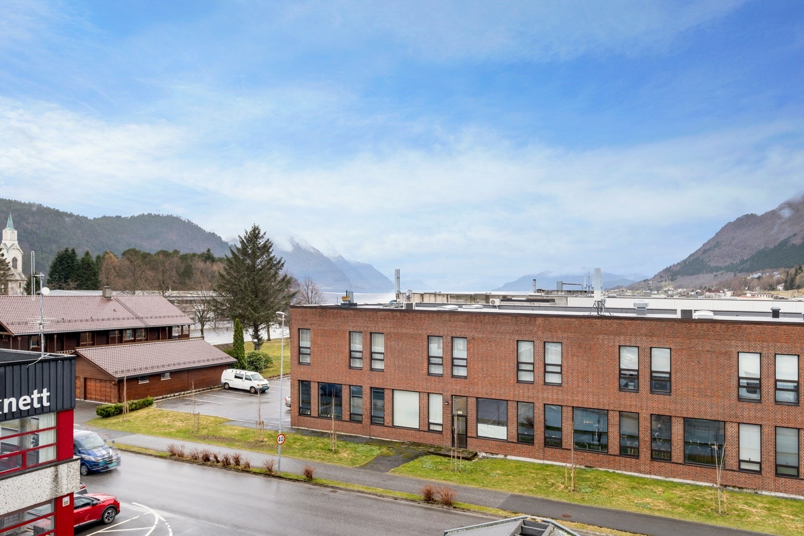 Utsikt vestover mot Ørskogvika og Storfjorden. Galleribilde