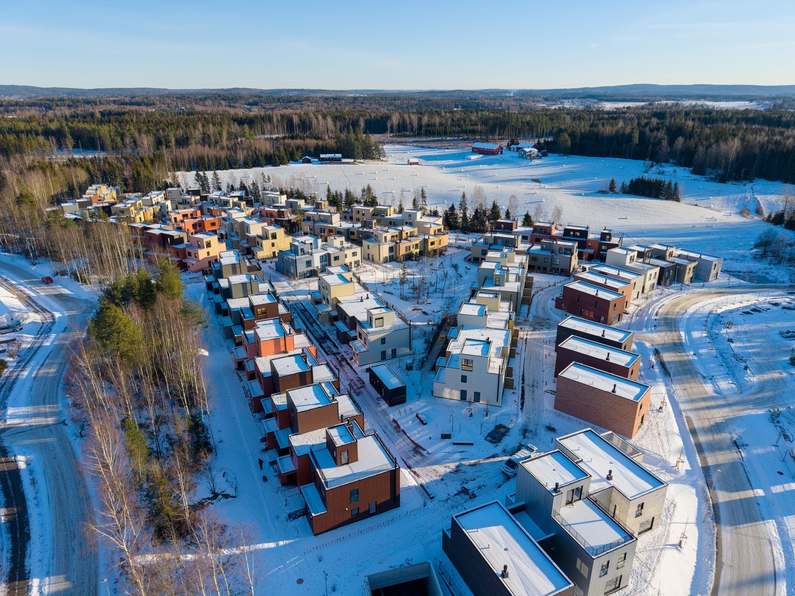 Variert og gjennomtenkt arkitektur gir prosjektet et unikt preg og skaper en hyggelig og inviterende atmosfære. Galleribilde