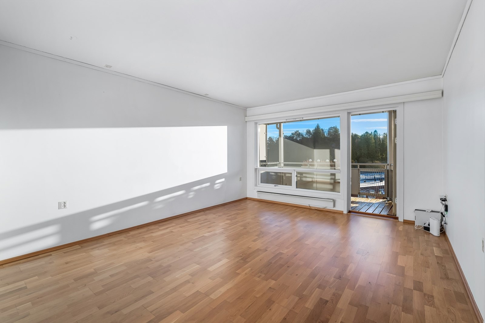 Stuen er av god størrelse og har plass for sofa og spisestue. Galleribilde