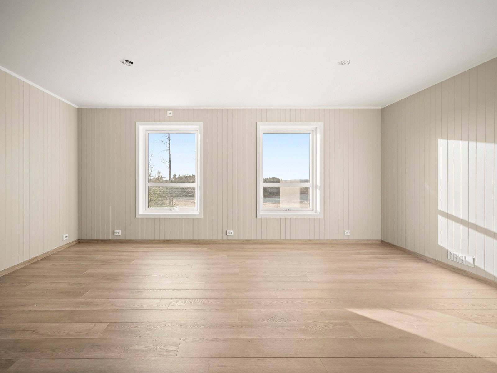 Romslig stue i utleiedelen. Galleribilde