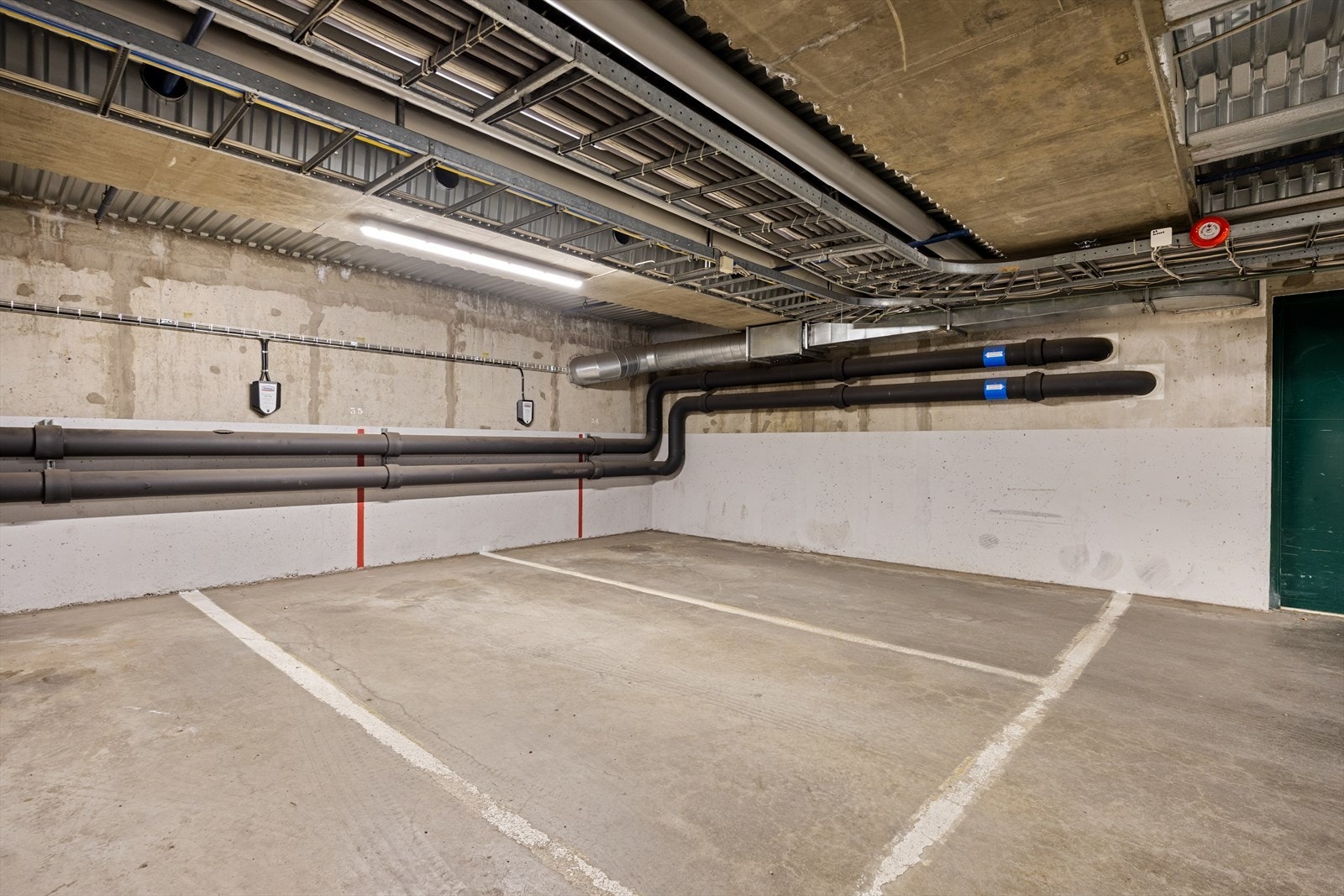 Det medfølger en parkeringsplass i felles garasjeanlegg Galleribilde