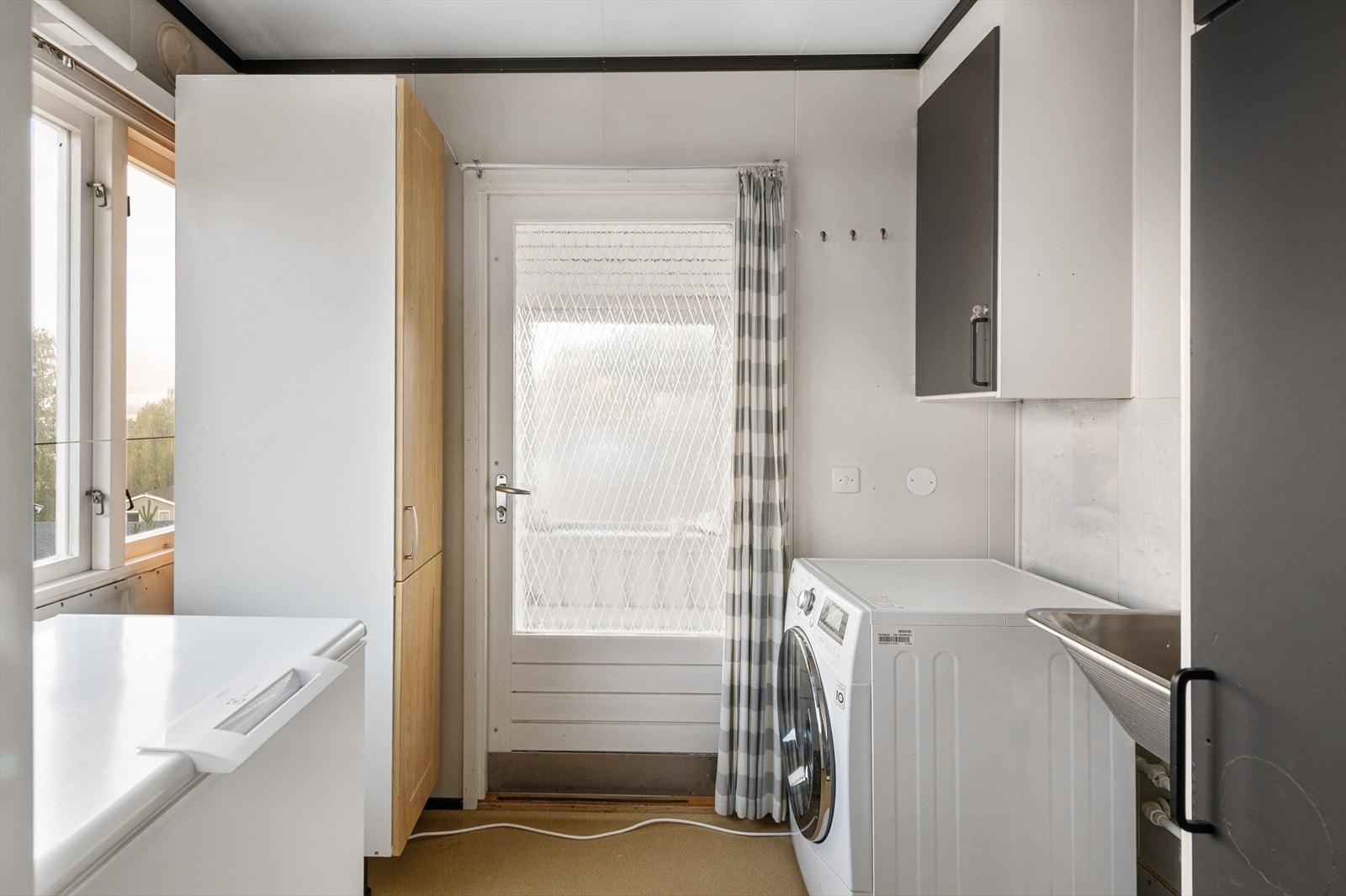 Vaskerommet er ved kjøkkenet og har egen inngang. Galleribilde