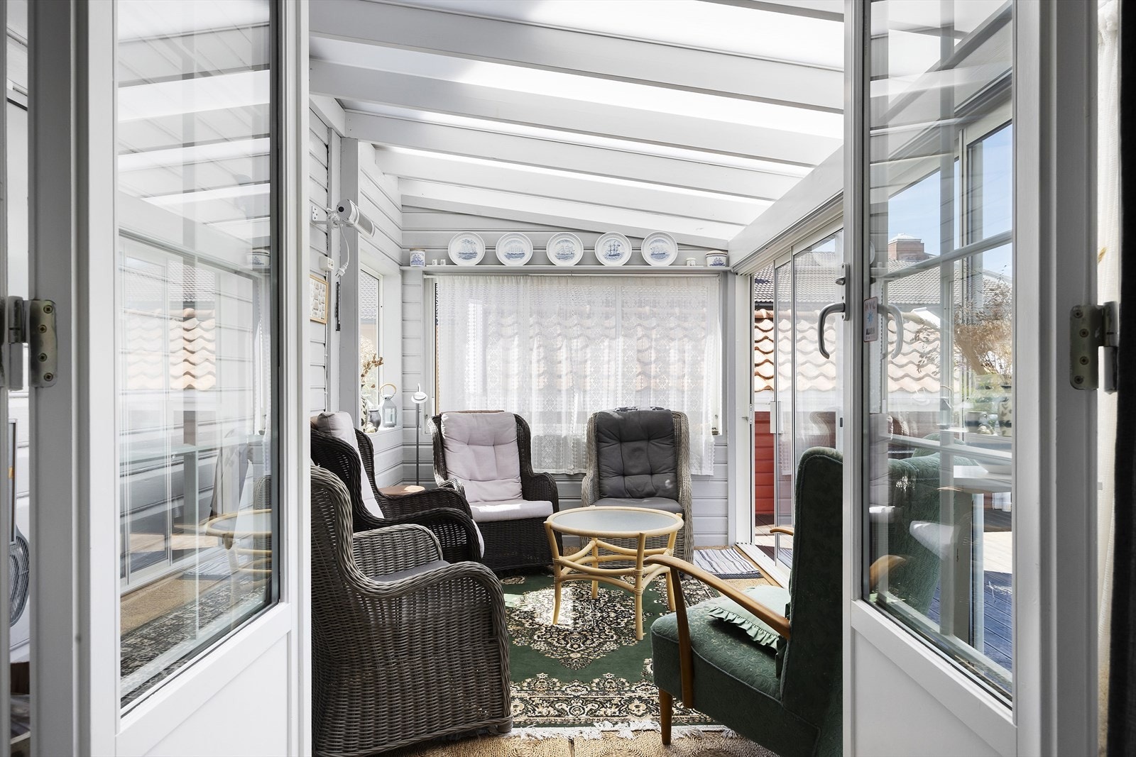 Utestue i forbindelse med tv / daglig-stue Galleribilde