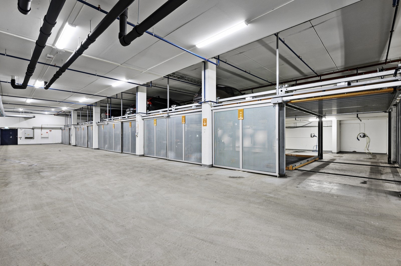 Det medfølger garasjeplass med el-lader i felles garasjeanlegg. Galleribilde