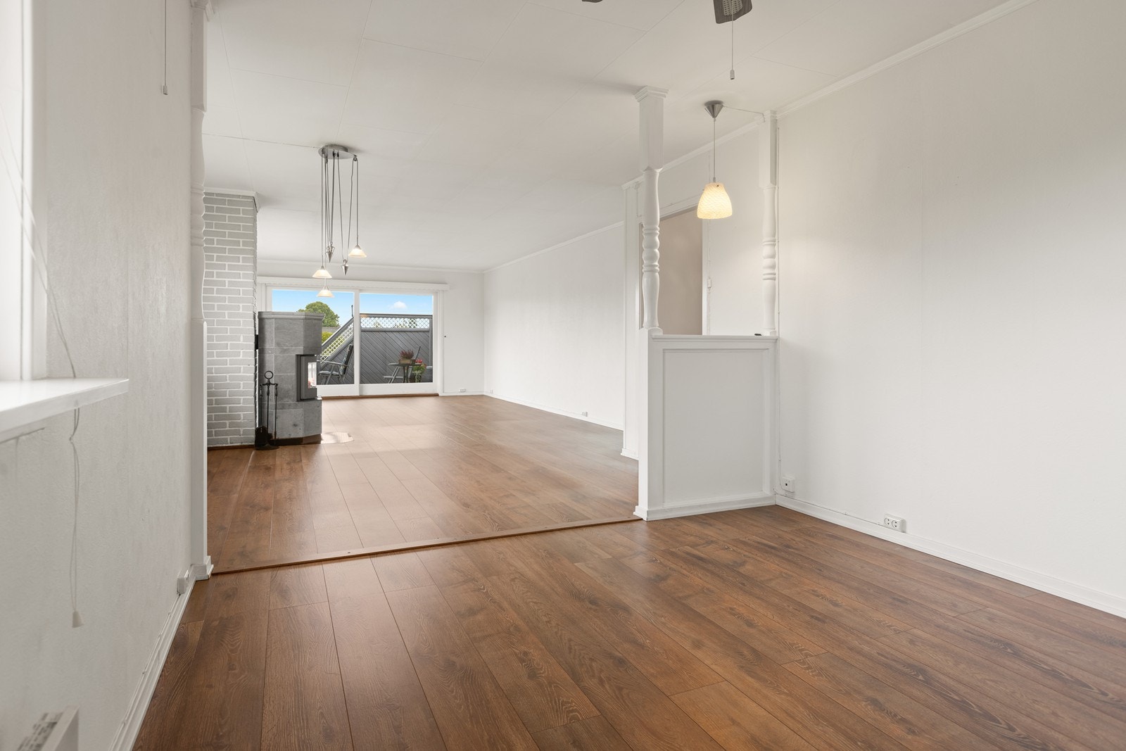 Det er åpnet opp fra et tidligere soverom for å få en større stue. Galleribilde