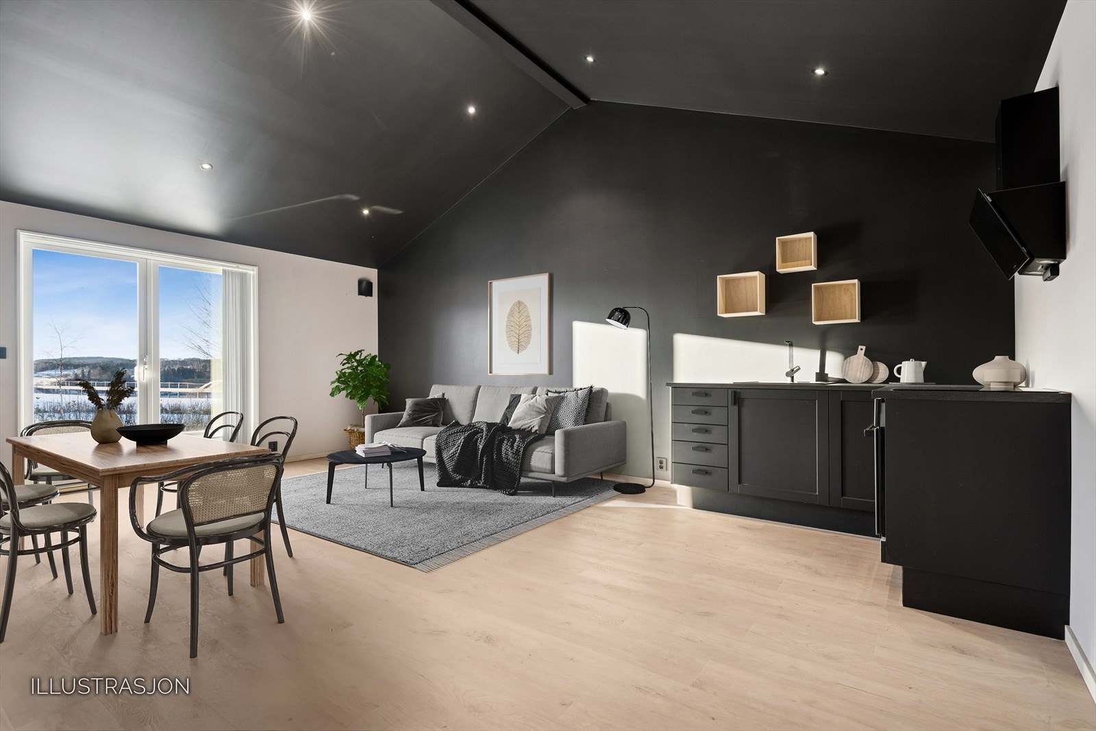 I tilbygget fra 2022 finner vi en moderne stue og kjøkkenløsning med utgang til hagen. Galleribilde