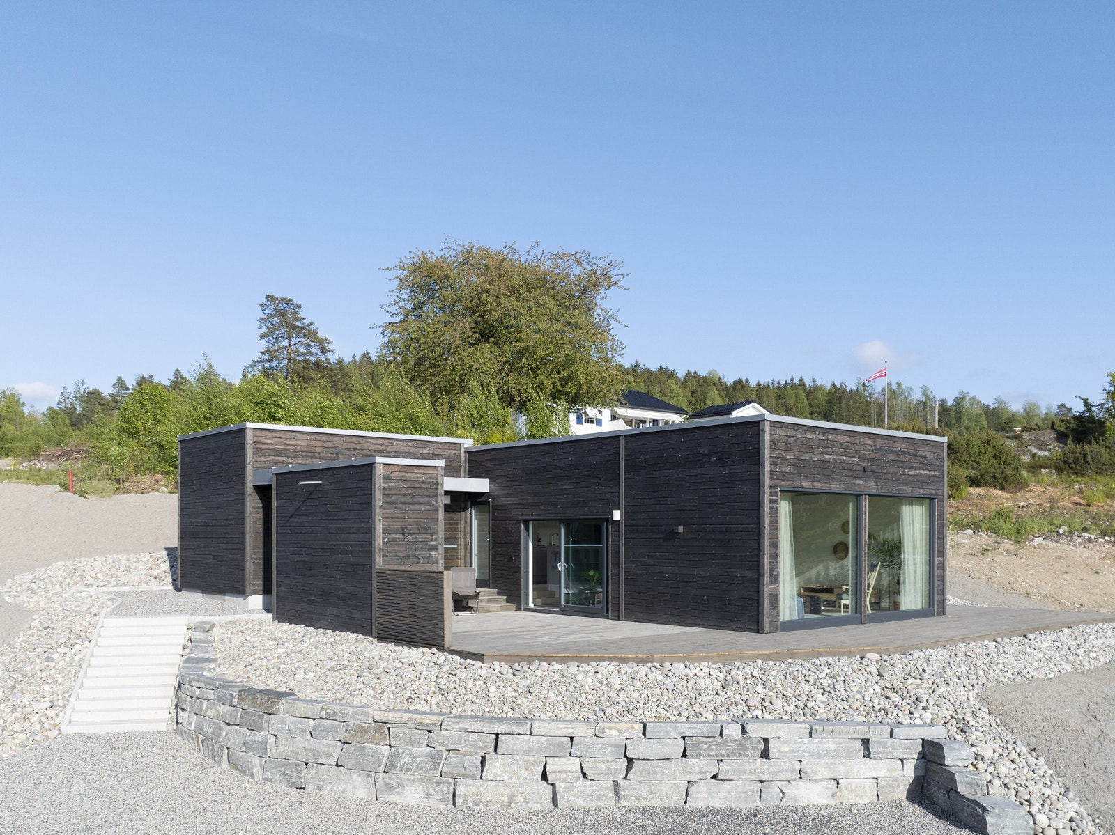 Utvendig bilde av en annen lik hytte Galleribilde