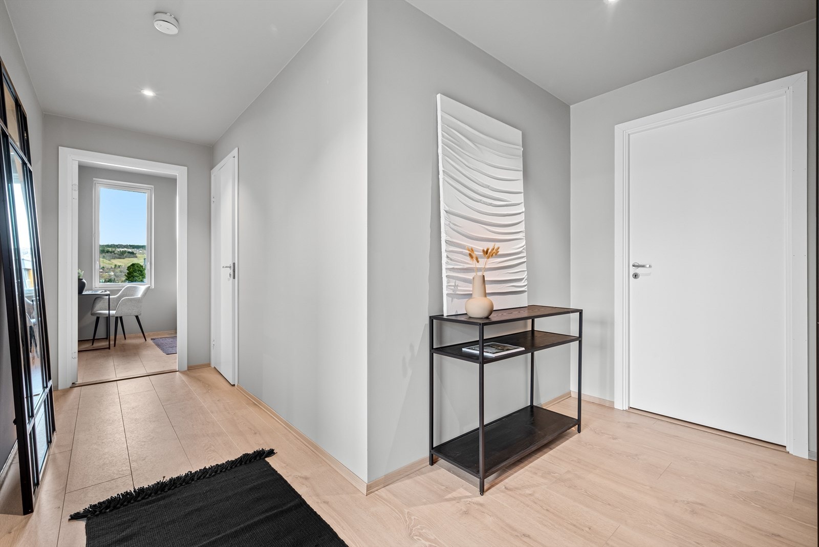 Som grunnoppvarming i leiligheten har man vannbåren varme Galleribilde