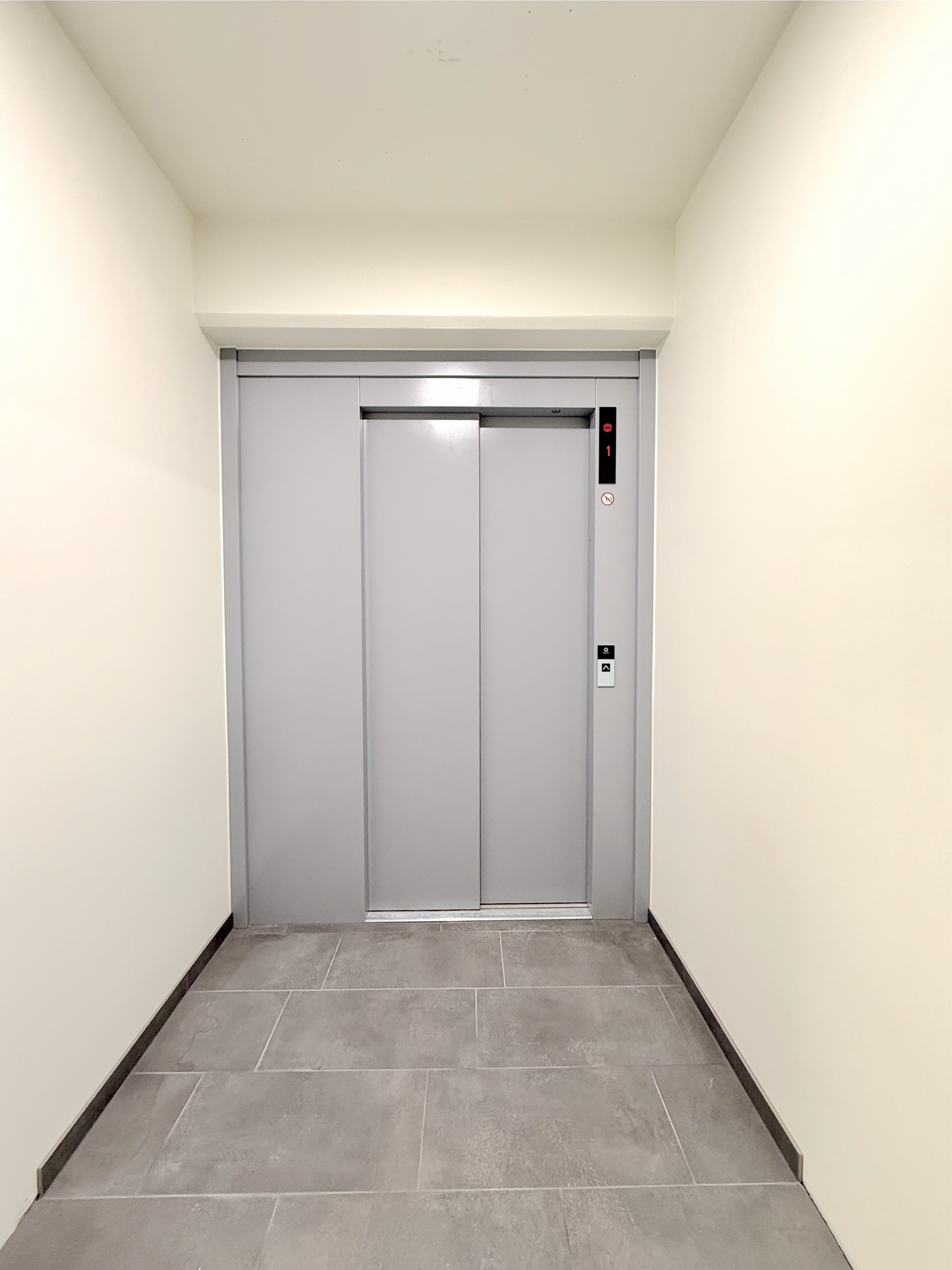 Heis i bygget gir enkel adkomst til leiligheten, direkte fra parkeringsanlegget. Galleribilde