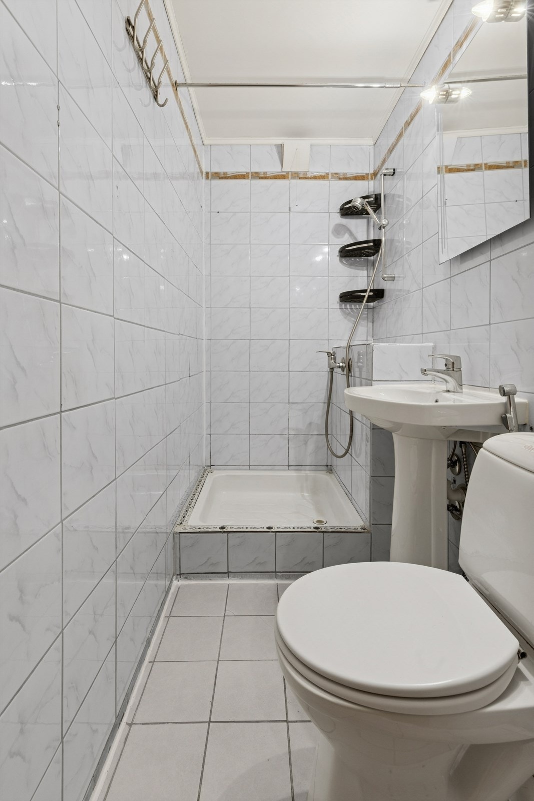 Begge badene er flislagt og har varmekabler i gulv. Galleribilde