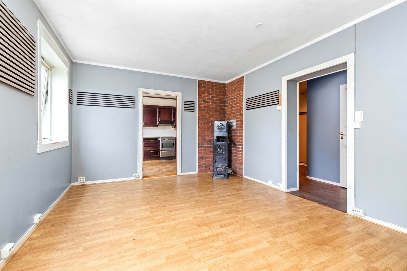 I stuen er det ovn i hjørnet. Galleribilde