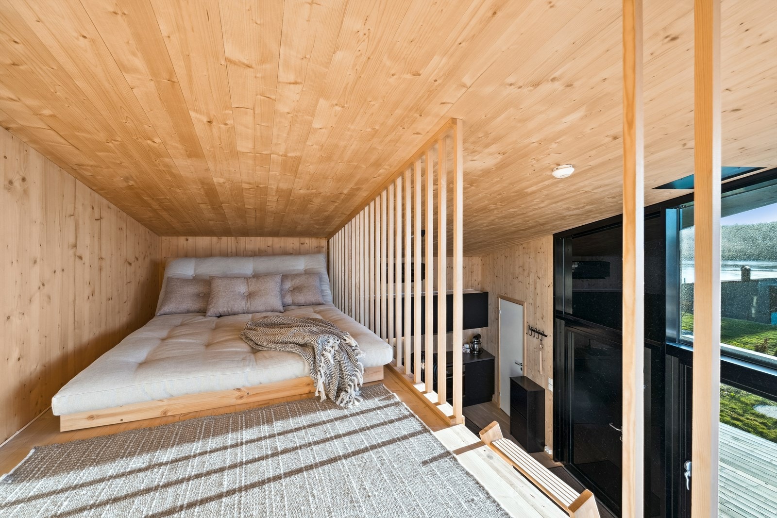 Flott hems med plass til en herlig daybed, perfekt som lesekrok, Tv-titting eller spill. Galleribilde