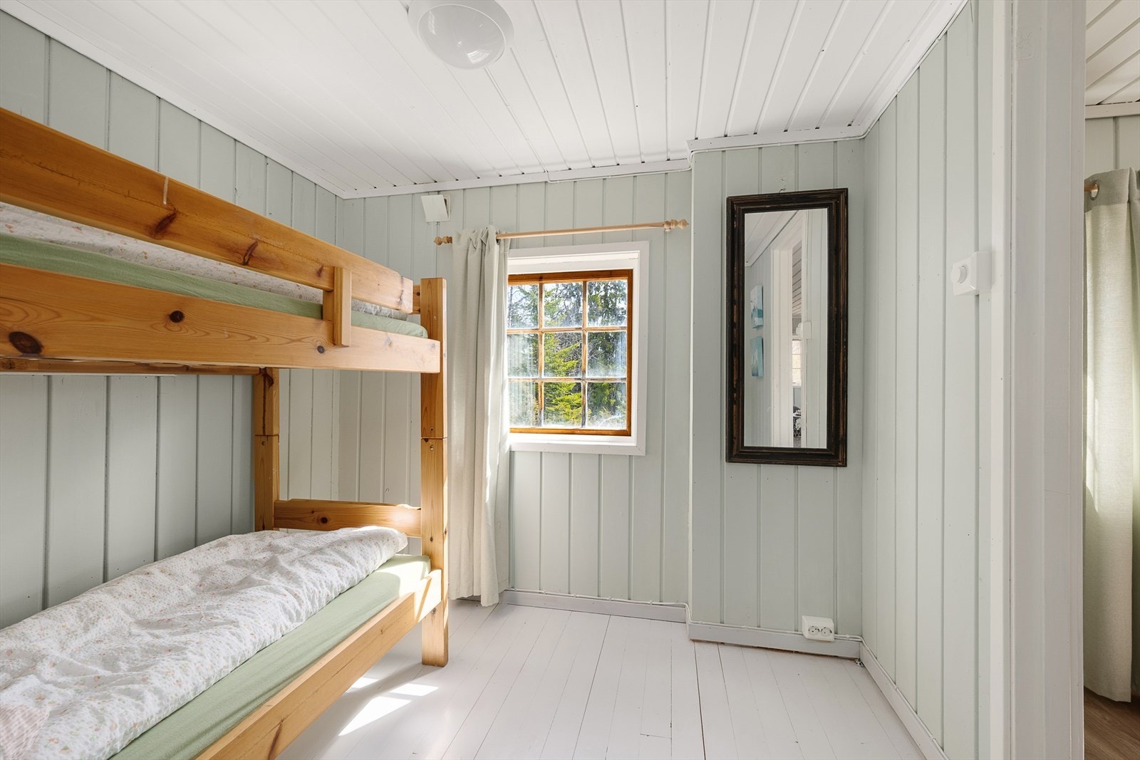 Soverommet er lyst og innbydende. Galleribilde