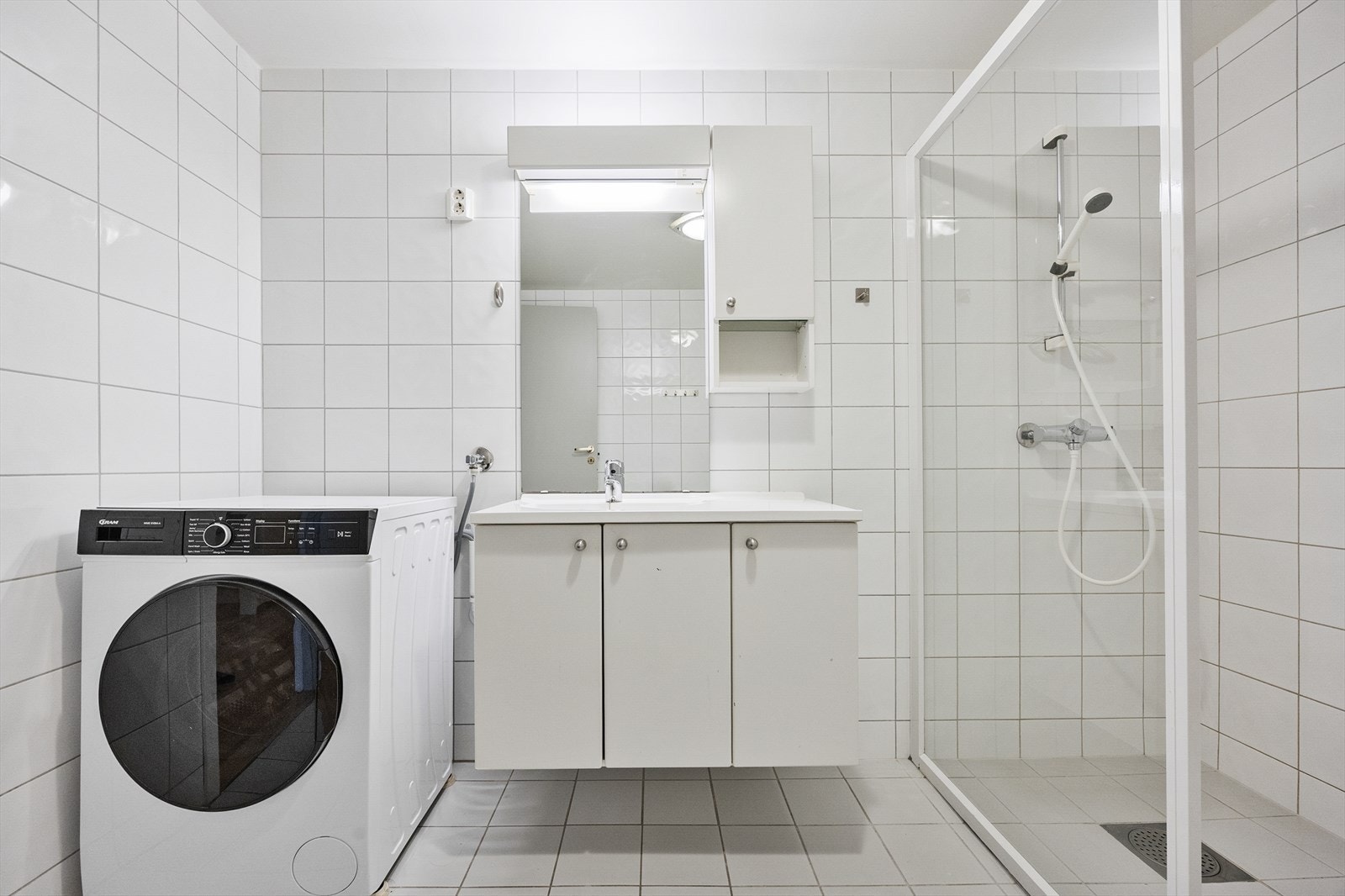 Badet har opplegg for vaskemaskin. Galleribilde