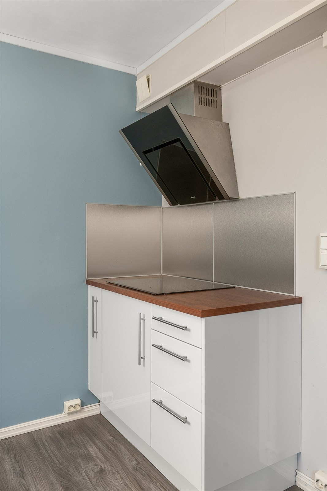 Elektrisk avtrekk over platetopp. Galleribilde