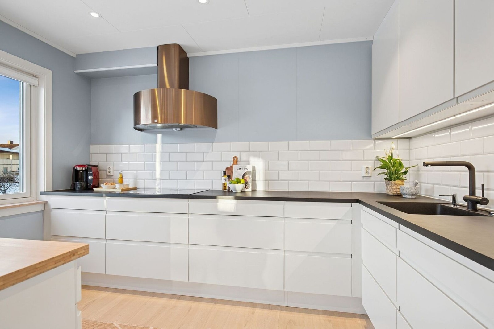 Kjøkkenet er leilighetens øyenfanger. Galleribilde