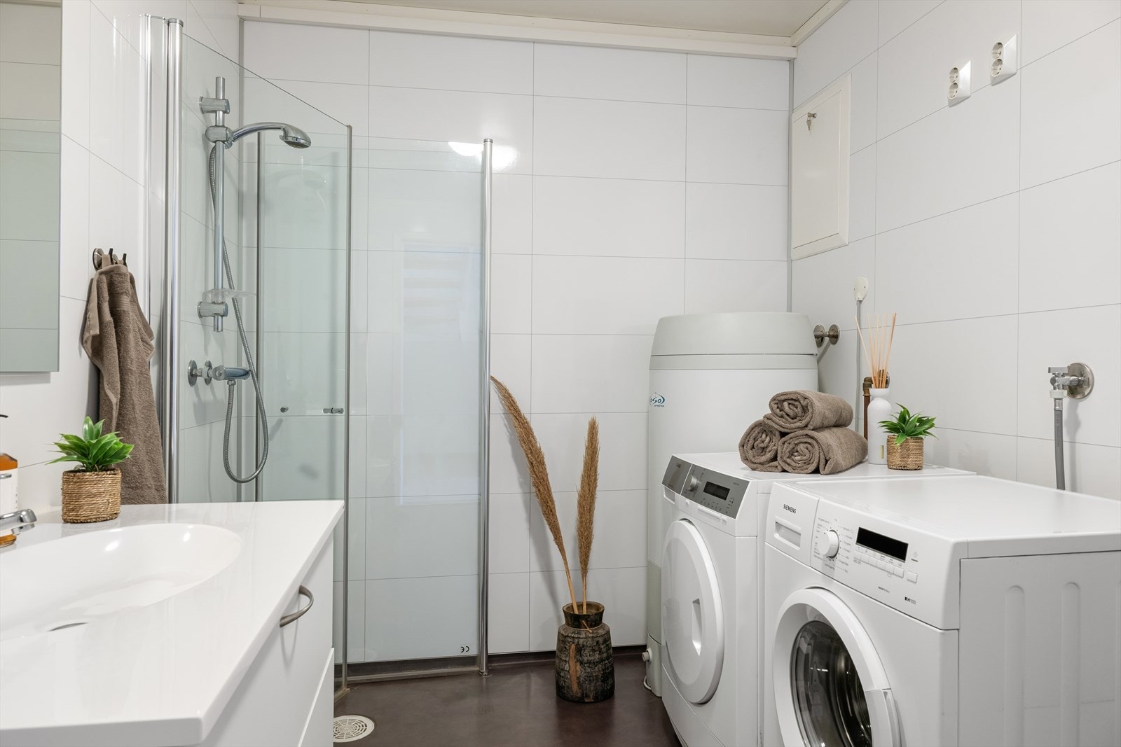 Badet har også opplegg for opplegg for vaskemaskin og tørketrommel. Galleribilde