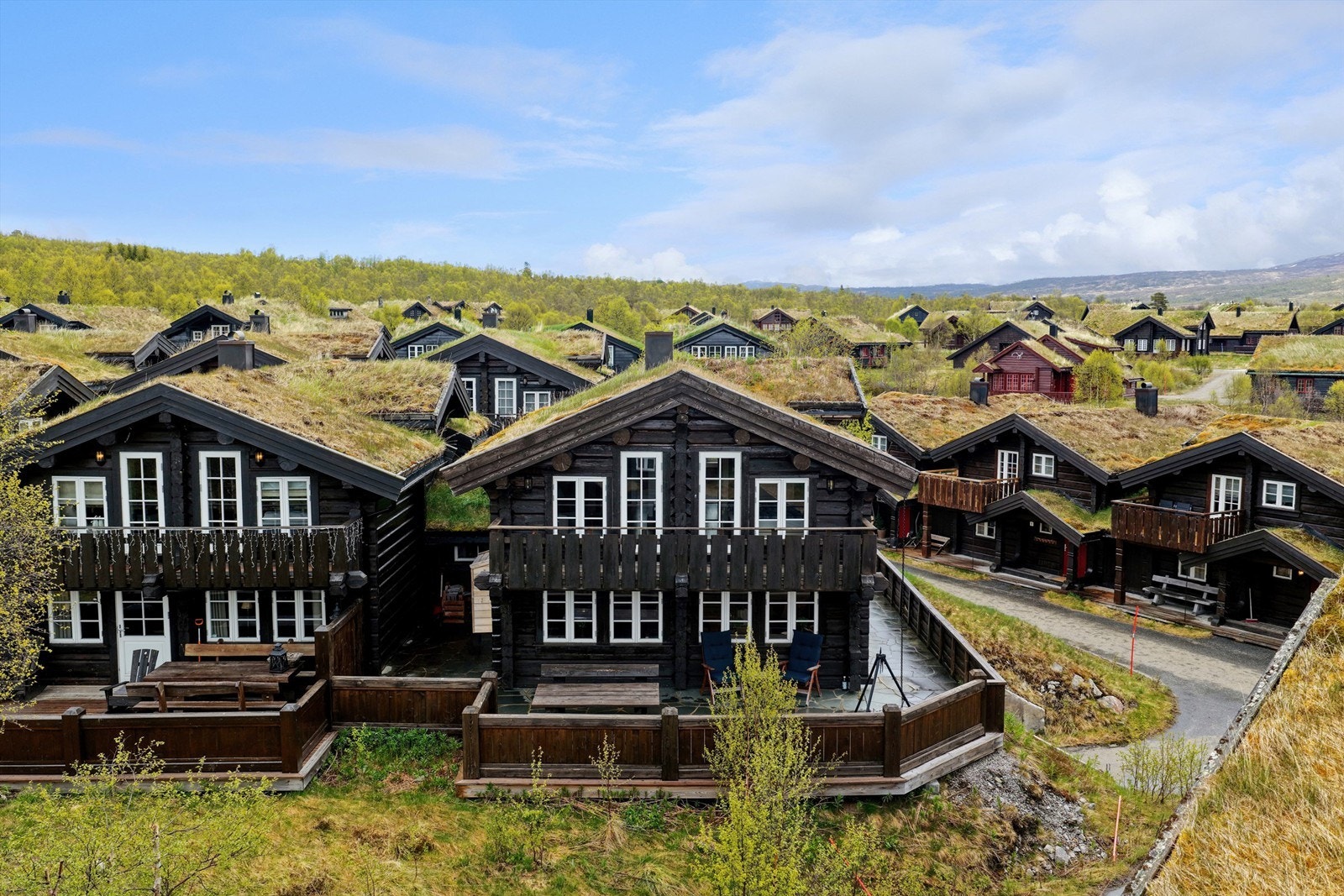 Endehytte med stor terrasse og to sider Galleribilde