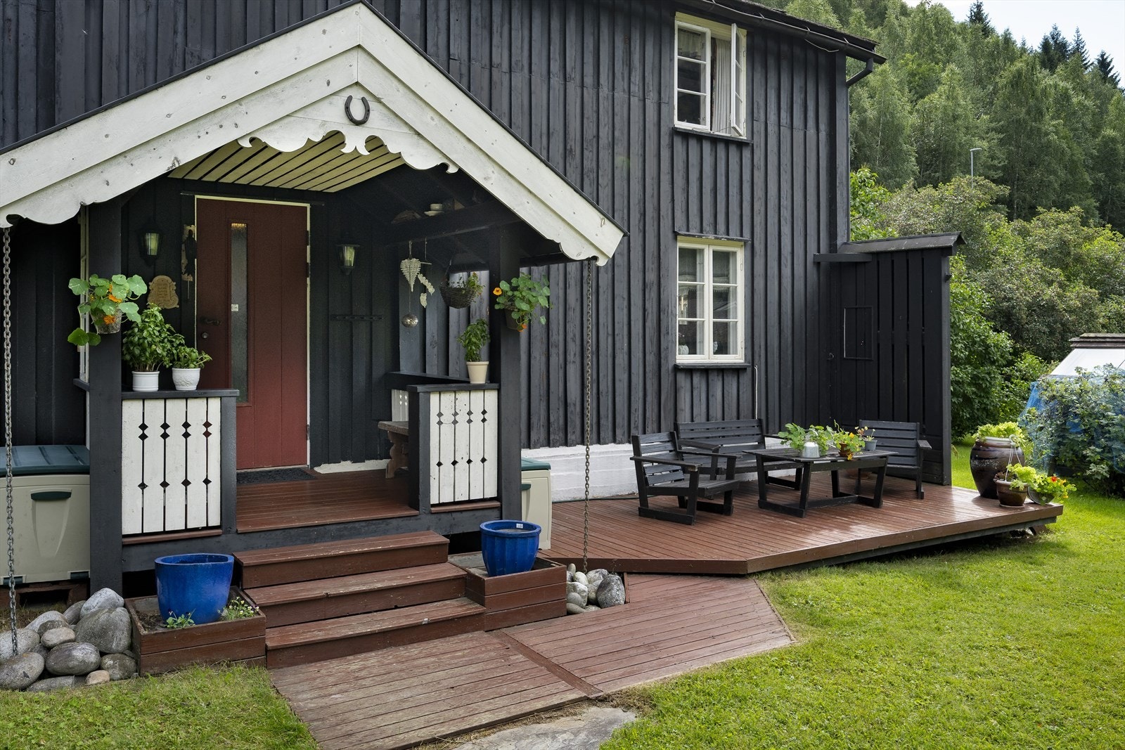 Et hyggelig, overbygd inngangsparti. Galleribilde