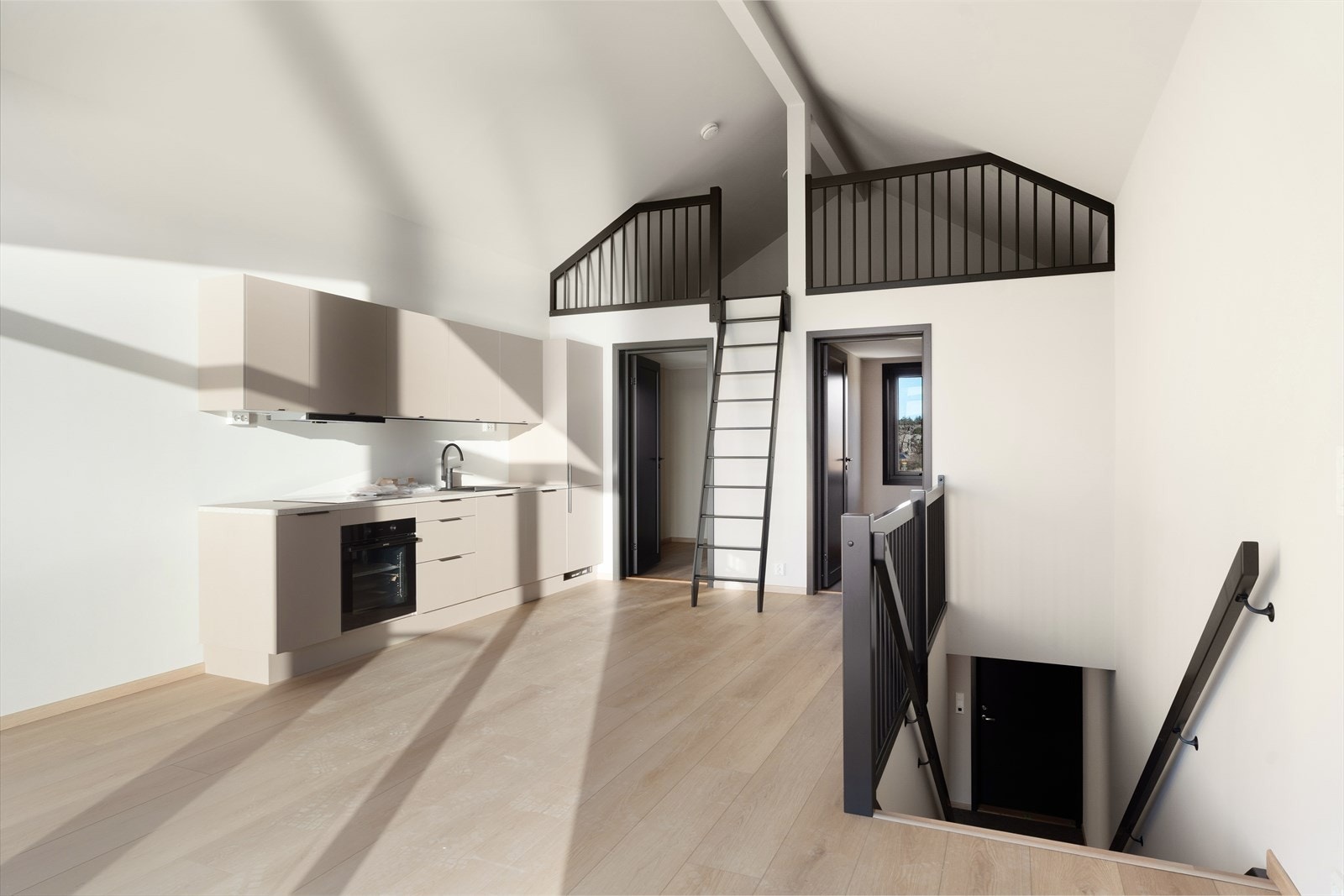 Eksempel på stue/kjøkken med hems i lagerbygg Galleribilde