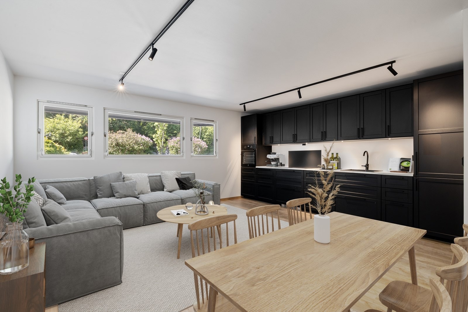 Kjøkkenet er lekkert innredet med profilerte fronter som gir et tidløst og elegant uttrykk. Galleribilde