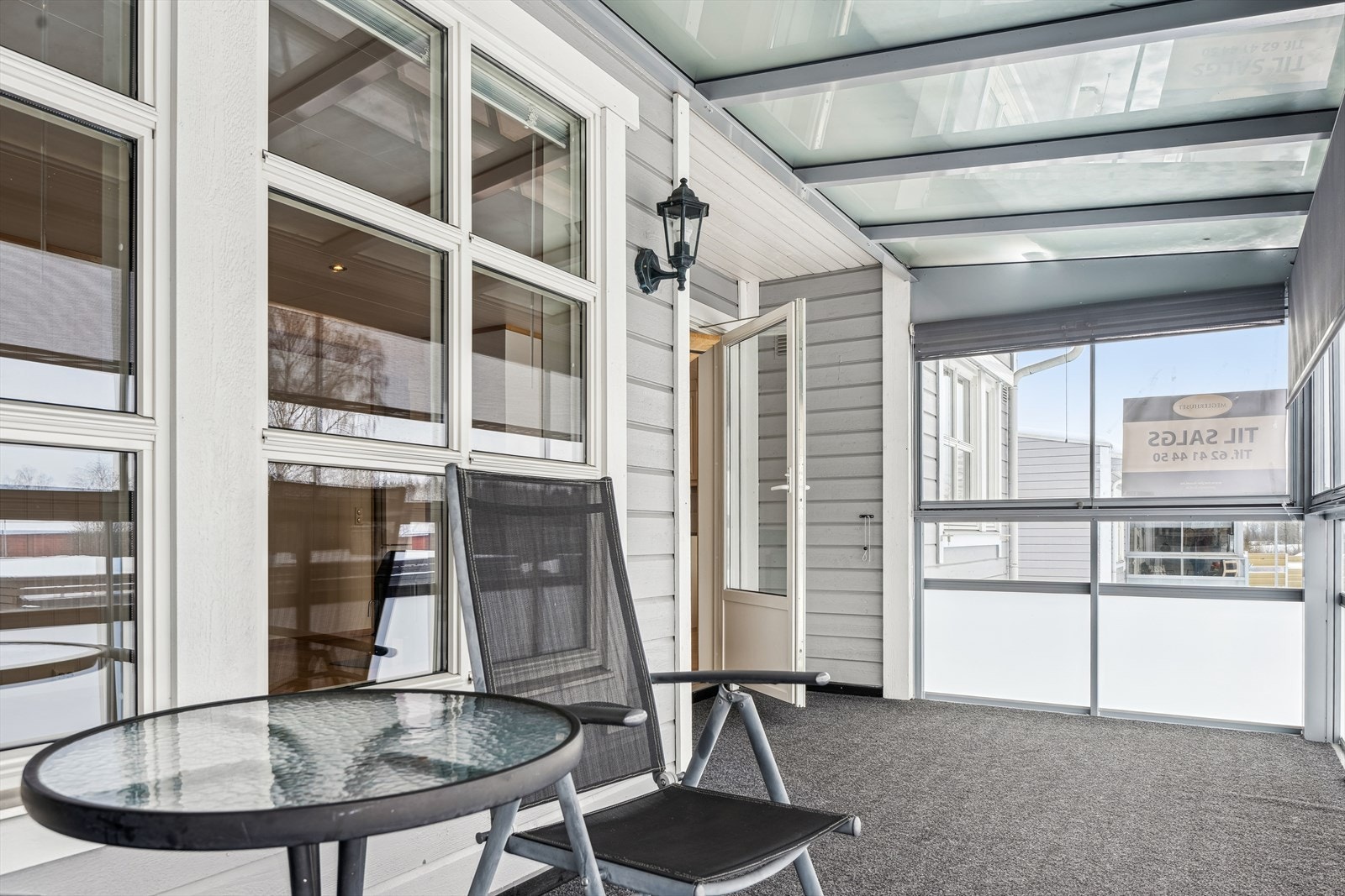 Innglasset terrasse. Galleribilde