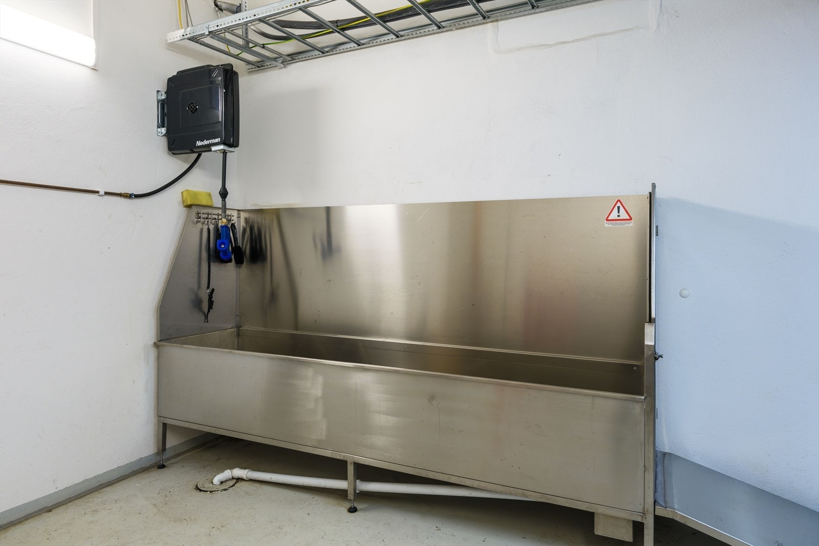 Sykkelverkstedet tilbyr blant annet sykkelvask og luftpumpe for påfylling av dekk. Galleribilde