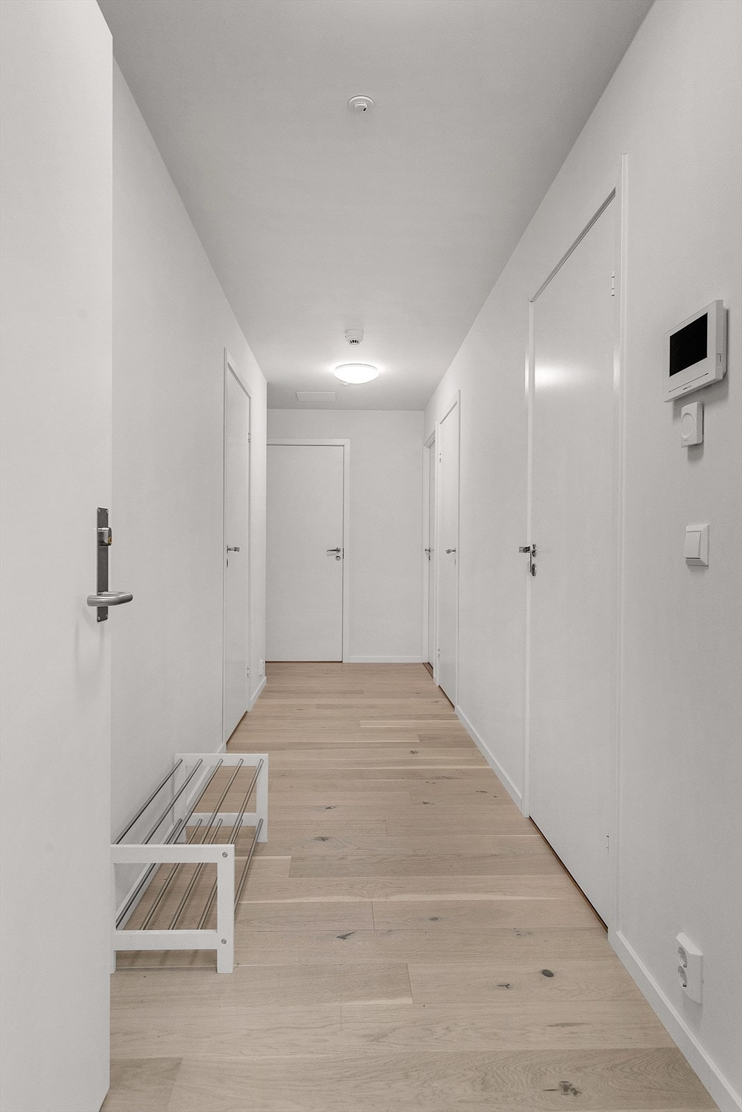 Velkommen inn! Forbi inngangsdøren venter en stilfull leilighet med to soverom. Galleribilde