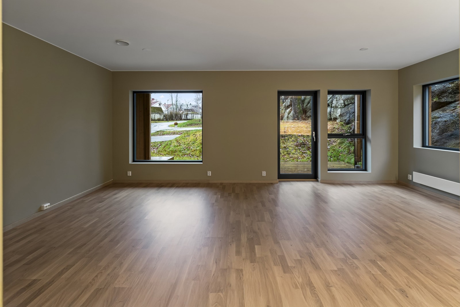 Stue og kjøkken i åpen løsning Galleribilde